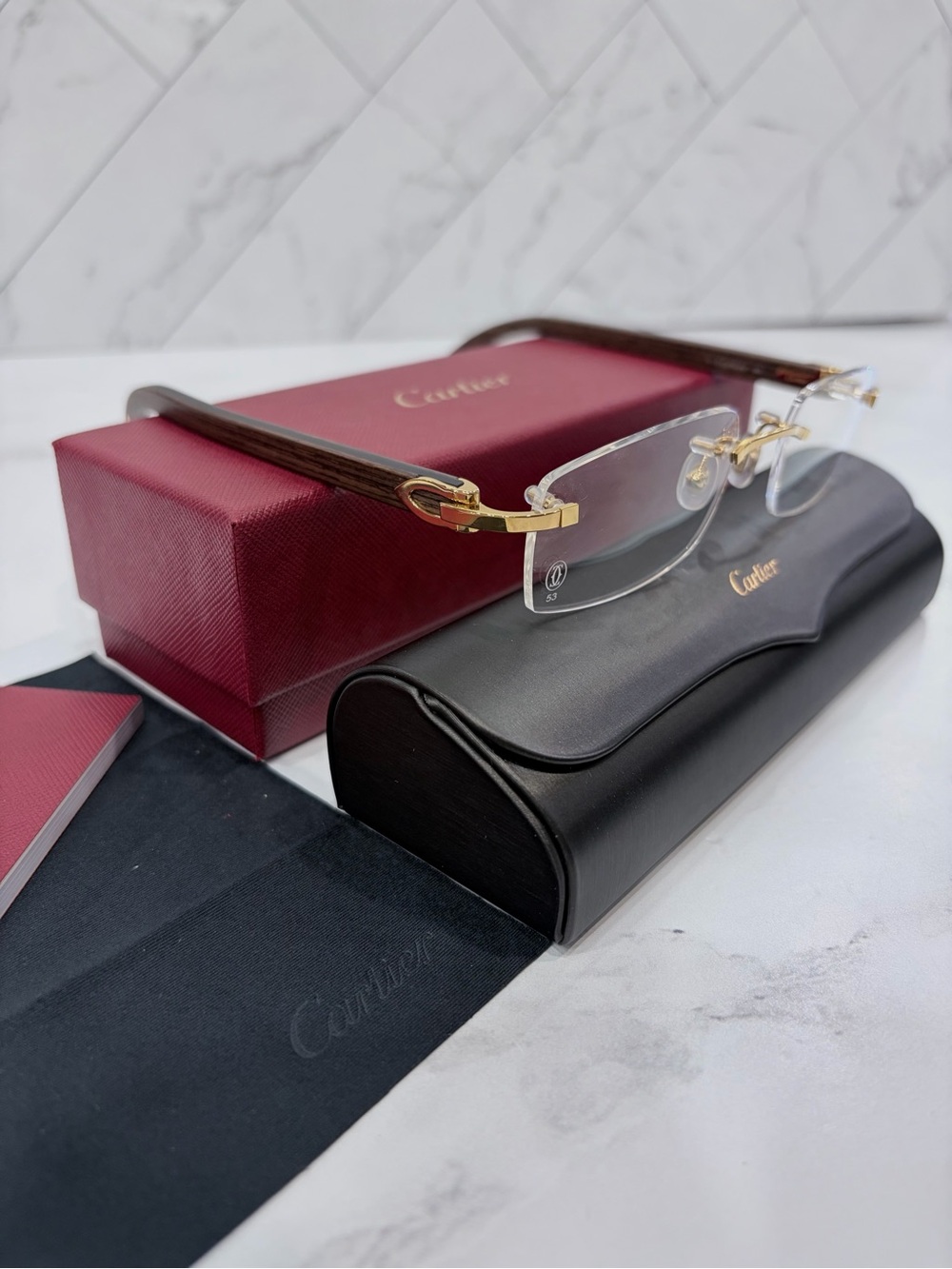 Cartier SUNGLASSES WITH ELONGATED C
DE CARTIER MOTIF